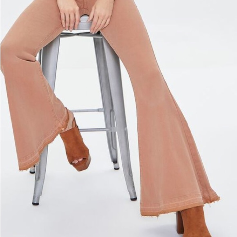 NEW! Rare Free People we the free flare 🍑 jeans